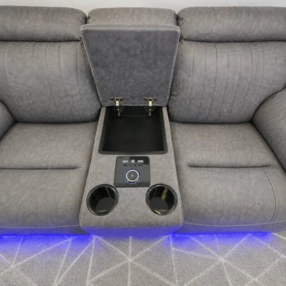 Grey fabric corner sofa with blue LED lighting for a home cinema look