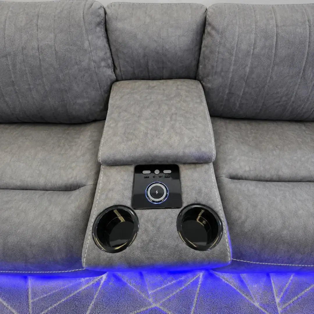 Grey corner sofa with stainless steel cup holders and centre storage console