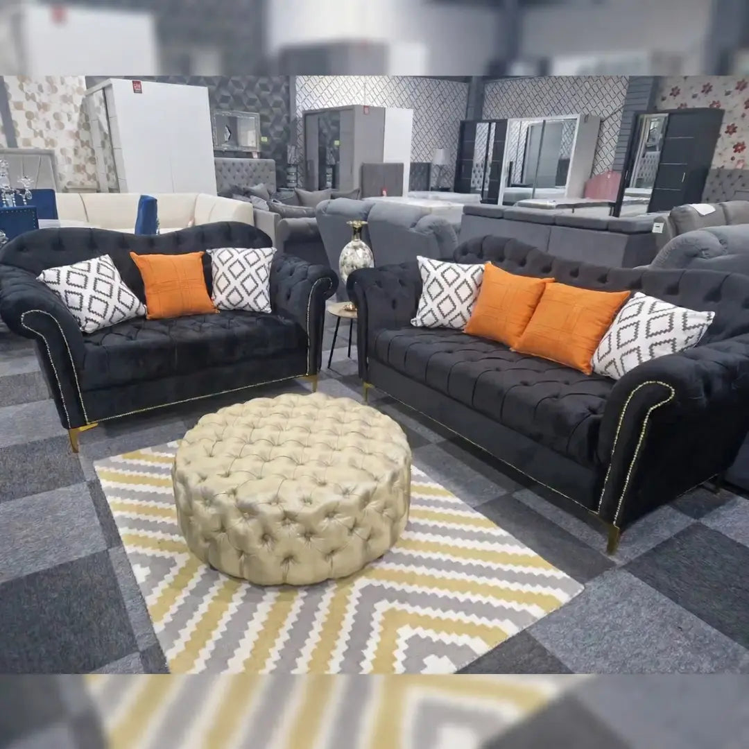 Black Elegance Chesterfield Sofa 3+2 from My New Sofa Ltd, showcasing plush upholstery and classic tufted design.