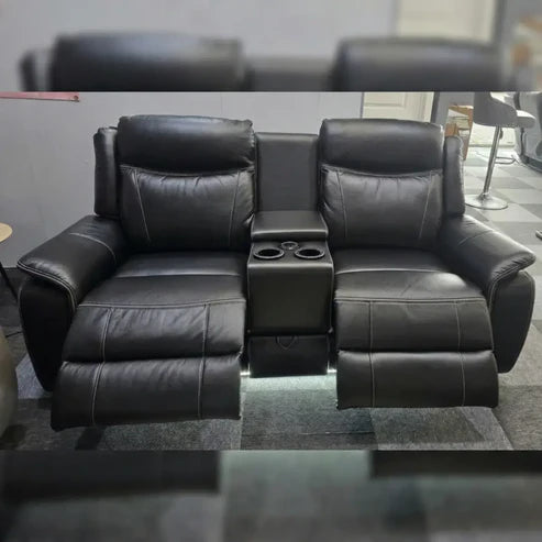 Prada leather electric recliner sofa set styled in a family living room